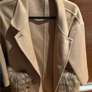 Beige cashmere and wool coat with real  fur pockets never worn no tags